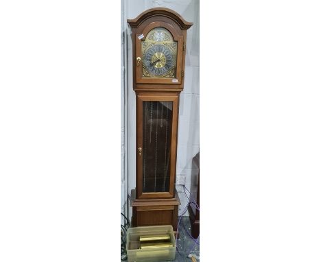 Reproduction longcase clock by Interlock, the arched hood enclosing gilt dial with silver bezel, three-weight movement behind