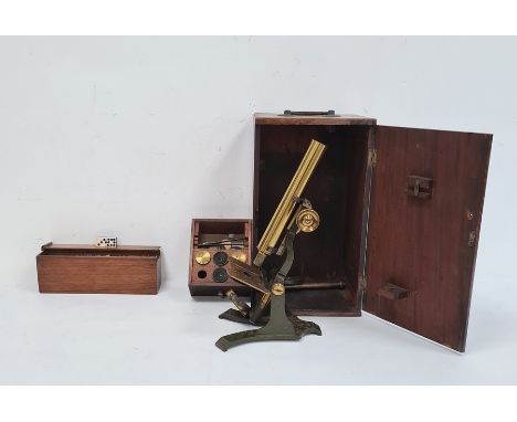 Metal and brass microscope in wooden box and a bone and ivory nine-spot domino set in 19th century wooden mahogany box (2) 