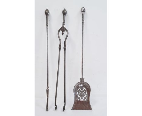 Set of three steel fire tools to include a poker, tongs and shovel with pierced fretwork 