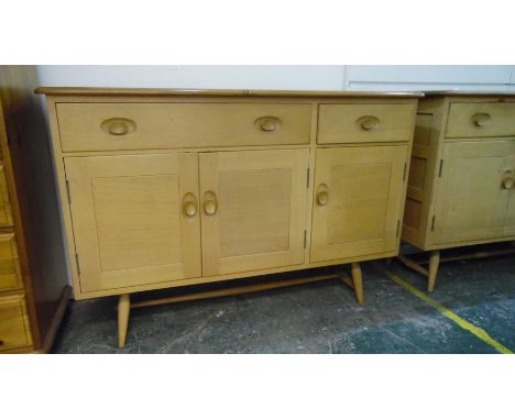 Lucian Ercolani Ercol model 351 elm-topped sideboard with beech body, two drawers and three cupboard doors, on turned support