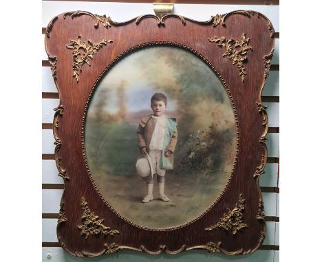 Jan Bacon Toms(?) Highlighted print Young boy holding white hat, signed lower right, in oval frame, 29cm x 24cm 