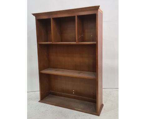 Modern open bookcase, the top shelf pigeonholed, plinth base, 92cm x 124cm