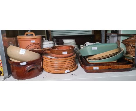 Collection of earthenware plates, casserole dishes, serving dishes, an original Suffolk crock for bread with a wooden lid, et