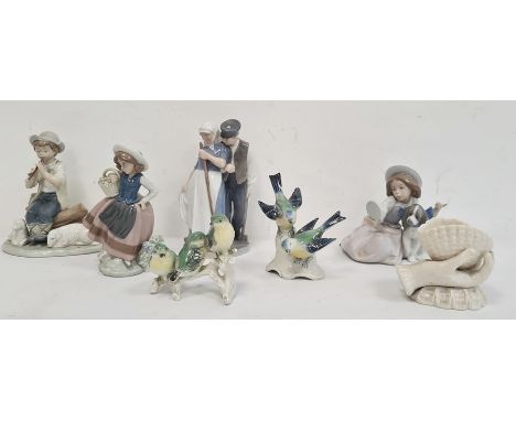 Two various Lladro figures, one with a girl carrying a basket the other seated with a dog, a Nao porcelain Lladro figure of a