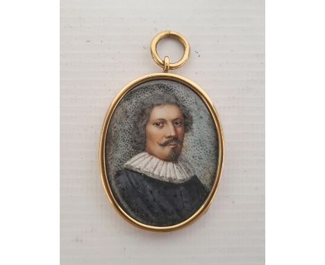 18th Century School Oval head and shoulders portrait miniature depicting a gentleman with ruff, in oval gold-coloured pendant