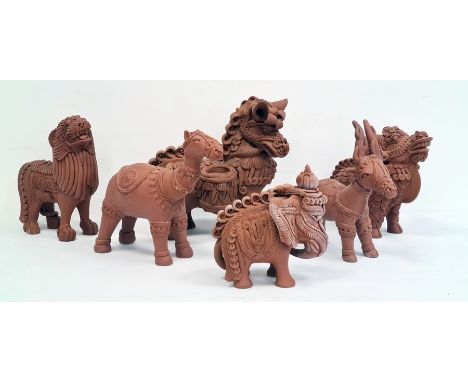 Collection of six various terracotta and glazed pottery model animals to include stylised elephant, horse, ram, etc (6) 