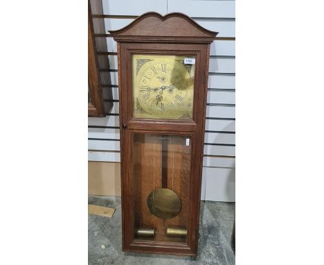 20th century oak rectangular weight-driven wall clock with brass Roman numeral dial, inscribed 'S V White, Stroud 1950', 89cm