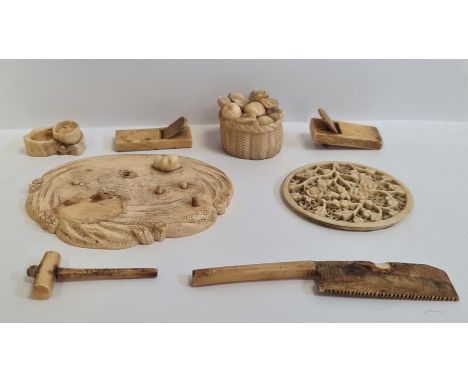 Small collection of antique Japanese carved ivory to include basket of fruit and other pieces on an oval base, signed, collec