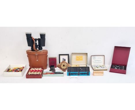 Pair of binoculars in leather case, a pocket chess and draughts, candle wax sealing set, dominoes, bezique game, a pewter tan