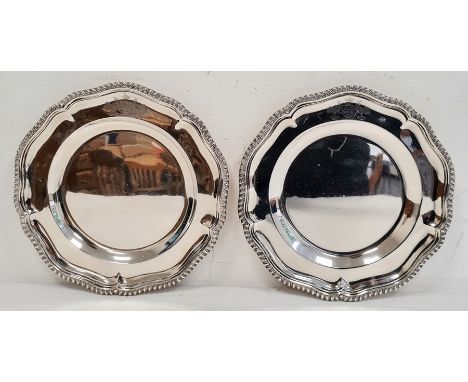Pair of 1930's silver cinquefoil-shaped dishes with gadrooned border, both with crest 'Illingworth Remembers', Sheffield 1934