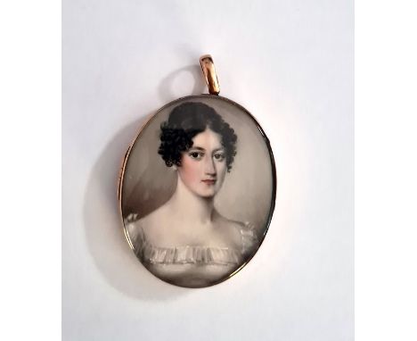 Regency portrait miniature on ivory, oval, head and shoulders of a lady in gold-coloured frame, with pendant loop, 8cm high o