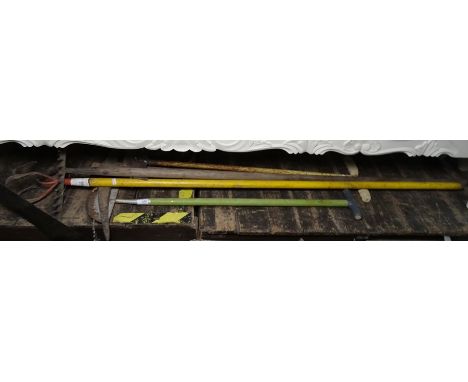 Small selection of gardening tools including half-moon spades, rakes, pick axe, etc 