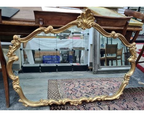 Large overmantel mirror, the shaped plate in moulded scrolling frame in the rococo manner, 90cm x 117cm 
