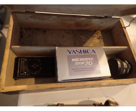 Copper top box containing Kodak vest pocket Autograph camera and two lenses 
