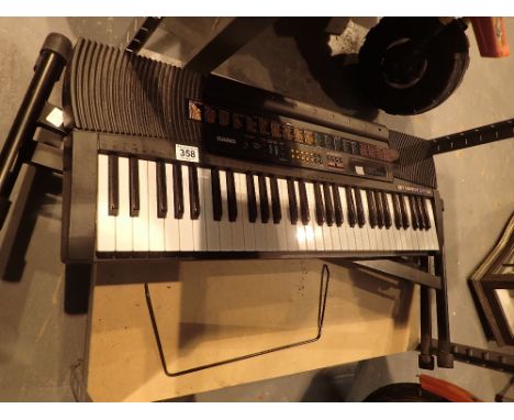 Casio CTK 520L organ and stand