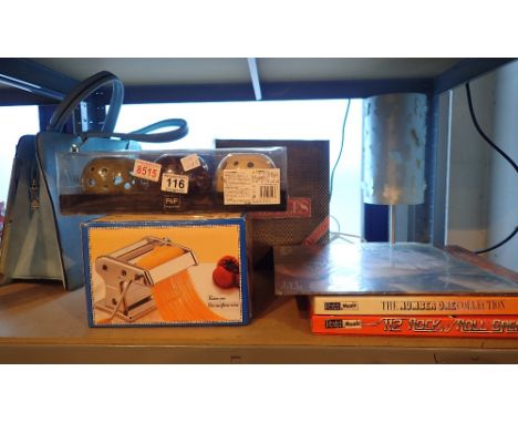 Shelf of mixed items including LP's, table lamp, pasta machine, handbag etc 