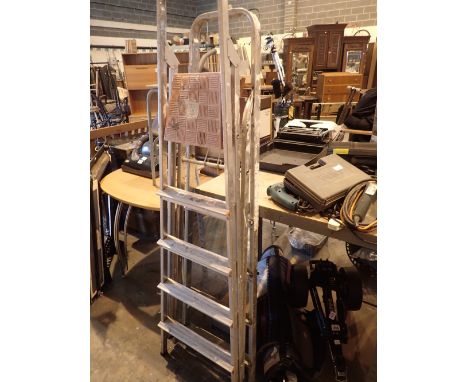 Two pairs of aluminium step ladders, approximately 5 ft