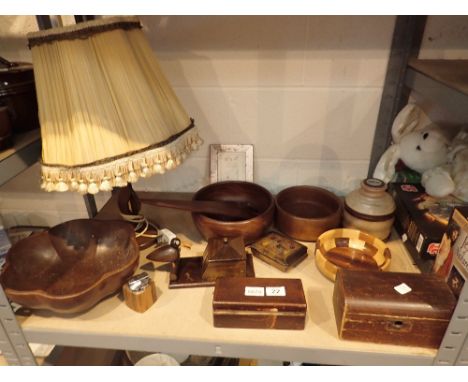 Shelf of wooden items including bowls, table lamp, boxes etc