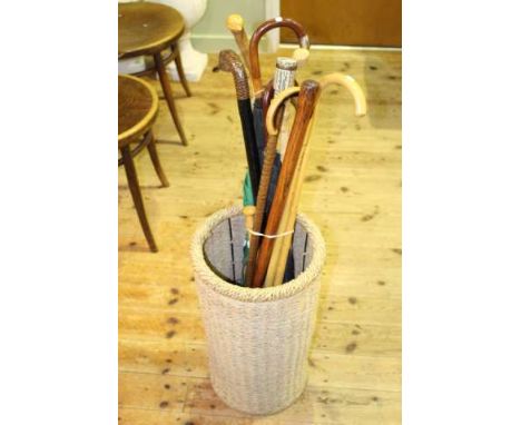 Wicker work stick stand and collection of sticks