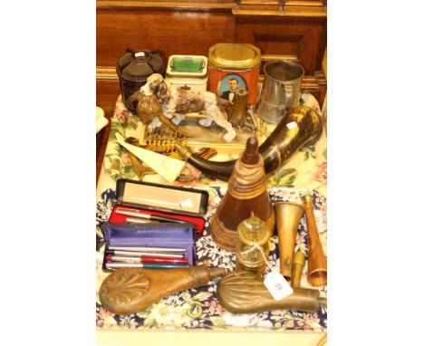 Three embossed and wood shot flasks, pens, horn, table lighter, pewter mug, tins, etc