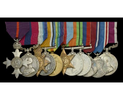 An Inter-War M.B.E. and Great War ‘Western Front’ D.C.M. group of ten awarded to Regimental Sergeant-Major E. H. Simmonds, Ro