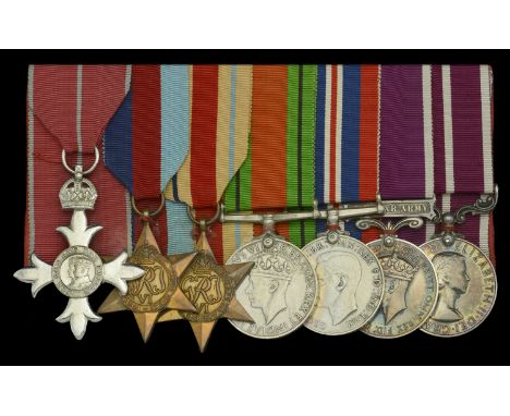 A post-War M.B.E. group of seven awarded to Major (Quartermaster) F. W. Wall, Royal Artillery   The Most Excellent Order of t