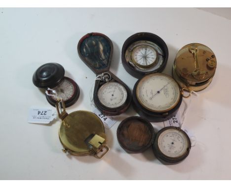 A GROUP OF INSTRUMENTS, comprising a pocket aneroid barometer signed F. Cooke & Sons, London, in fitted leather case, the lid