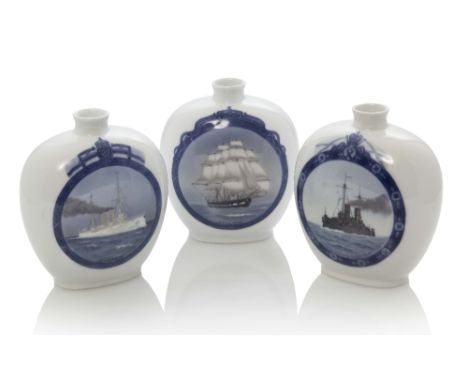 THREE EARLY 20TH-CENTURY ROYAL COPENHAGEN SPIRIT(?) FLASKS, each depicting a famous contemporary vessel, comprising Jylland u