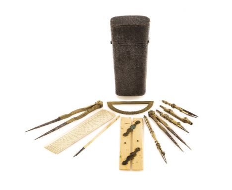 AN EARLY 19TH-CENTURY POCKET DRAWING SET, unsigned, of typical form, with instruments including dividers, compass, brass prot