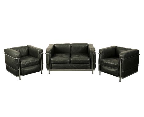 AFTER LE CORBUSIER (1887-1965) FOR CASSINA: AN 'LC3' TWO SEATER SOFA AND PAIR OF ARMCHAIRS with tubular chrome frames and bla