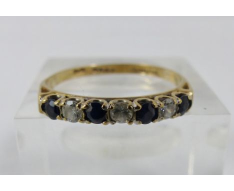 9 ct gold sapphire & white stone ring. Size R.