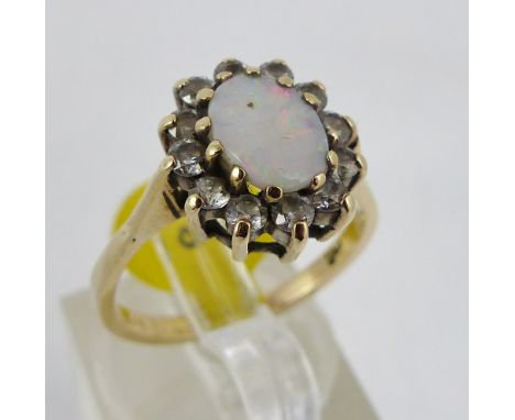 9ct gold opal and CZ cluster, recently reshaped. Size M