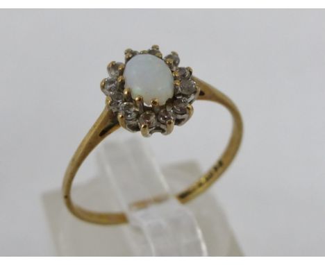 9 ct gold opal & diamond ring. Size M.