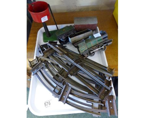 Original wind~up tinplate Hornby train set with engine, rolling stock and accessories