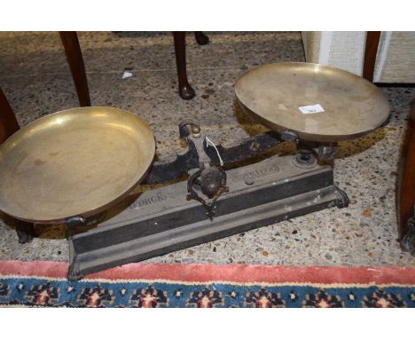 PAIR OF VINTAGE IRON AND BRASS SHOP SCALES