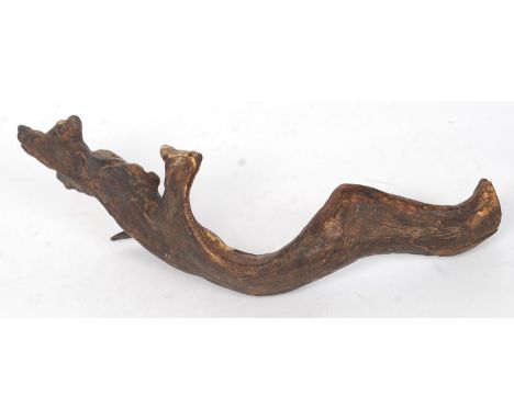 An unusual early 20th century carved hardwood tribal figurine of a Voodoo stick man ( see illustrations) 43cm Long. 