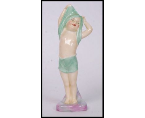 A Royal Doulton ceramic  figure entitled " To Bed " bearing model no HN1805 to the base- 16cm tall