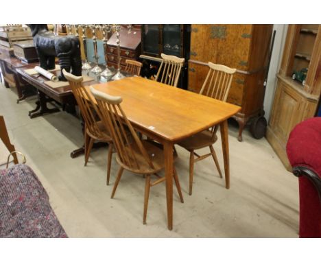 Set of Four Ercol ' Goldsmith' Windsor Pale Elm and Beech Dining Chairs together with an Ercol style Pale Oak Rectangular Din