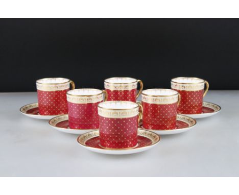 Set of Six Shelley Coffee Cans and Saucers decorated in burgundy with gilt stars 