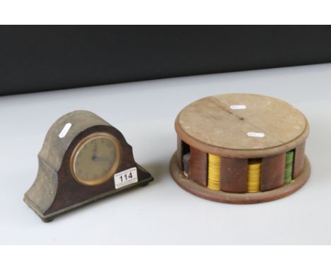 Rotating wooden gaming counter dispenser, with counters, together with a wooden mid 20th century German Kienzle mantle clock 