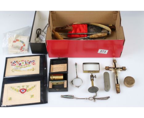 A box of mixed collectables to include silk postcards, button hooks, magnifying glass, crucifix...etc.. 