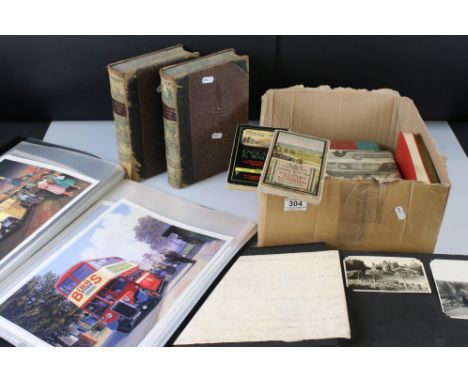 A box of mixed ephemera to include ordnance survey maps, vintage books and photographs within an album. 