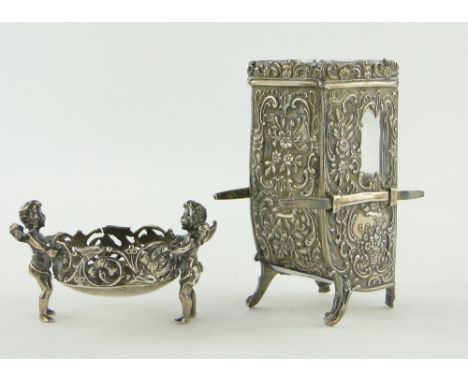 19th century Dutch silver cocktail stick holder in the form of a Sedan chair,
continental hallmarks and import marks, height 