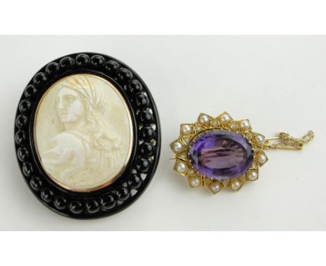 Gold amethyst set brooch
in pearl and diamond surround, width 33mm and a Victorian composition Cameo brooch, (2).