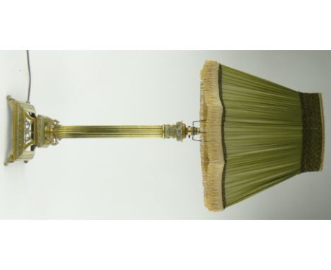 A brass Corinthian column table lamp
on square plinth with green shade, overall height 42", recently re-wired.