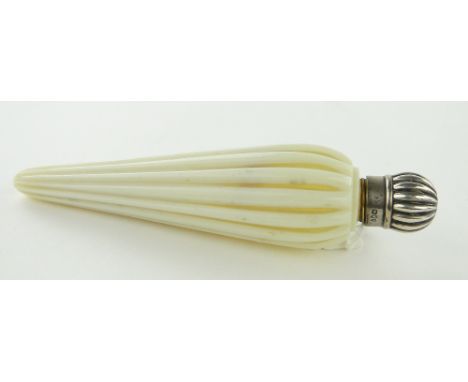 A Victorian opaque glass scent flask,
with silver top by S Mordan & Co., London 1884, length 14.5cm.