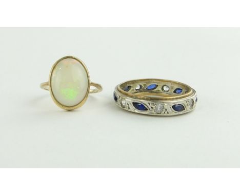 Sapphire and diamond eternity ring and an opal and gold ring, (2).