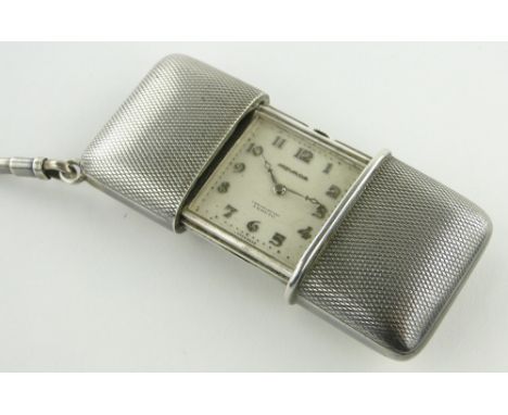 A Movado Ermeto Swiss silver cased travelling clock.