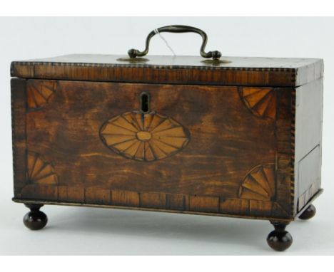 A Georgian tea caddy
with inlaid decoration and secret drawer, length 9.75".