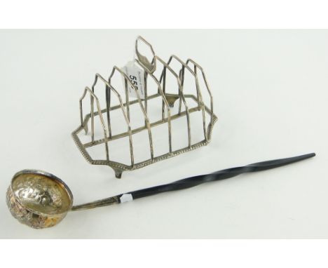 George III silver toast rack
and a silver toddy ladle with inset George II silver coin, (2).